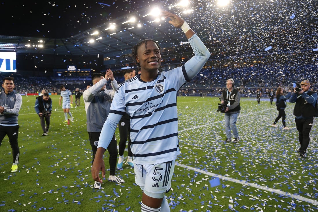 Mar 16, 2024; Kansas City, Kansas, USA; Sporting Kansas City defender Dany Rosero (5) celebrates with fans after defeating the San Jose Earthquakes at Children's Mercy Park. Mandatory Credit: Scott Sewell-USA TODAY Sports