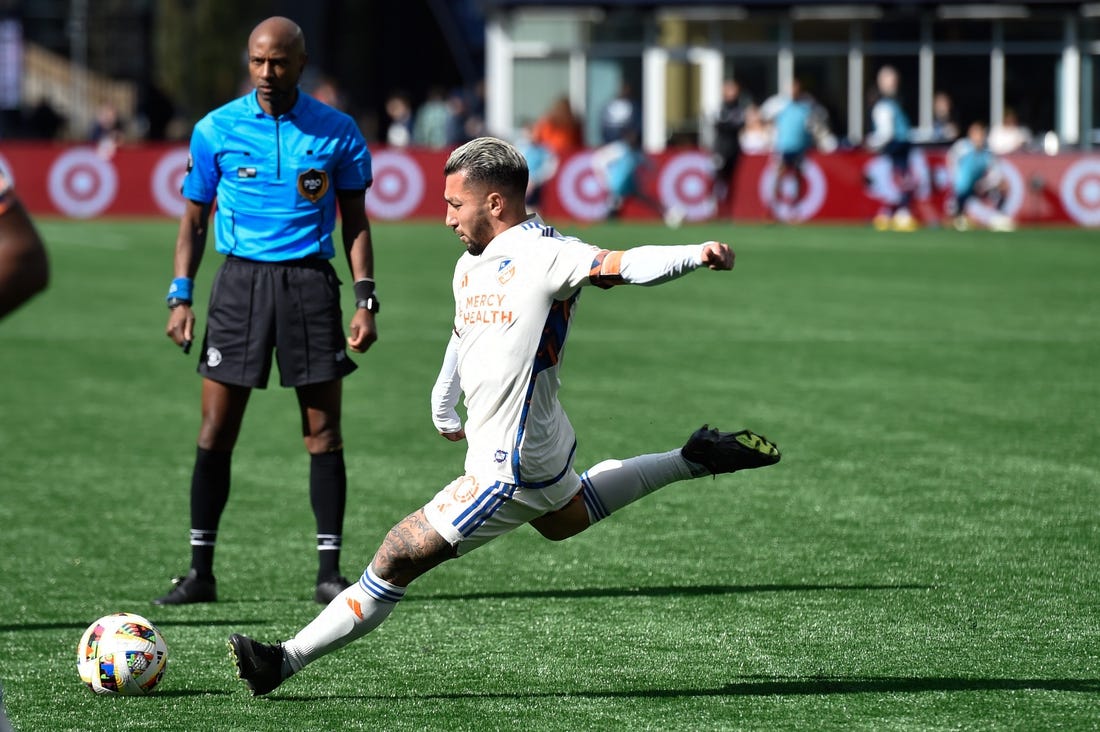 Mar 17, 2024; Foxborough, Massachusetts, USA; FC Cincinnati midfielder Luciano Acosta (10) scores a goal against the New England Revolution during the second half at Gillette Stadium. Mandatory Credit: Bob DeChiara-USA TODAY Sports