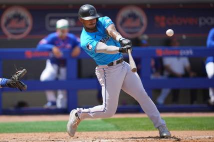 Mar 17, 2024; Port St. Lucie, Florida, USA;  Miami Marlins center fielder Dane Myers (54) hits a home run in the third inning against New York Mets at Clover Park. Mandatory Credit: Jim Rassol-USA TODAY Sports