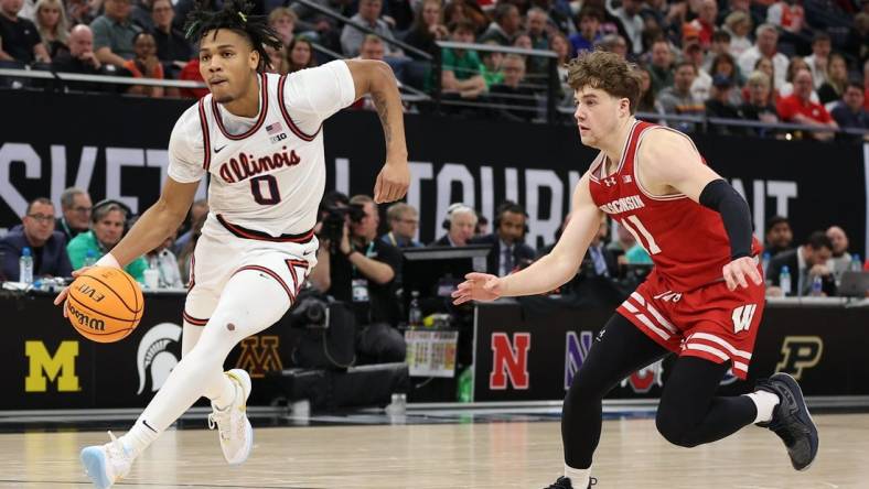 Mar 17, 2024; Minneapolis, MN, USA; Illinois Fighting Illini guard Terrence Shannon Jr. (0) plays the ball in the second half against the Wisconsin Badgers at Target Center. Mandatory Credit: Matt Krohn-USA TODAY Sports