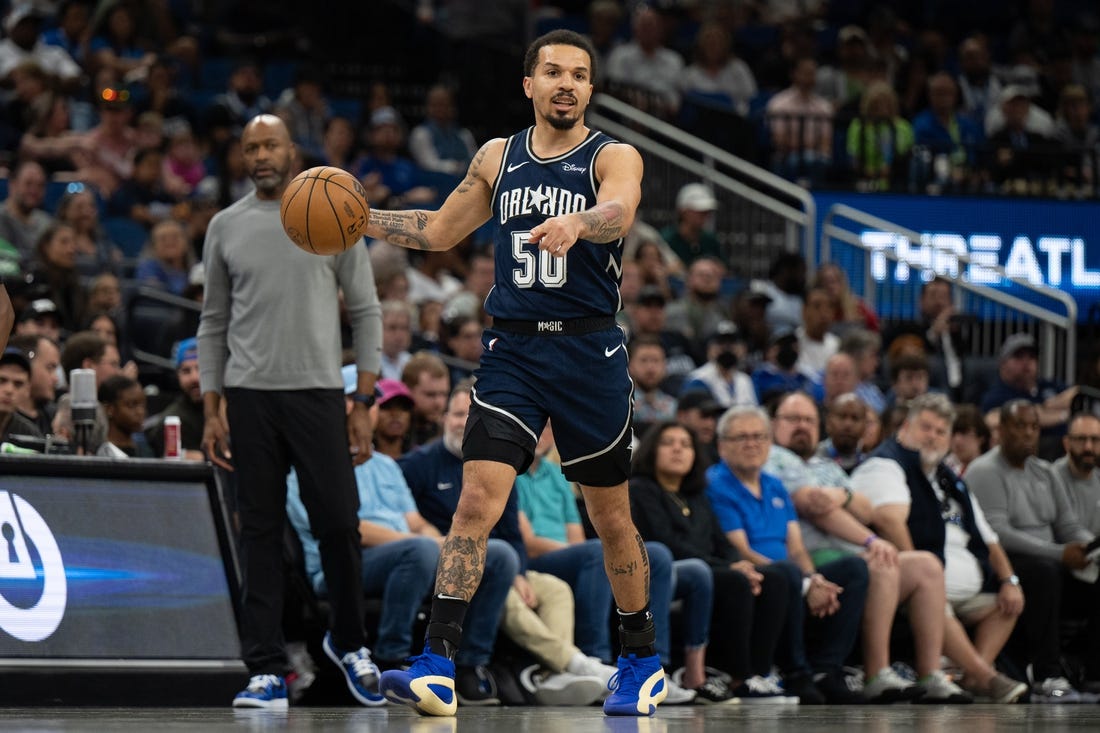 Mar 17, 2024; Orlando, Florida, USA; Orlando Magic guard Cole Anthony (50) dribbles the ball against the Toronto Raptors in the second quarter  at KIA Center. Mandatory Credit: Jeremy Reper-USA TODAY Sports