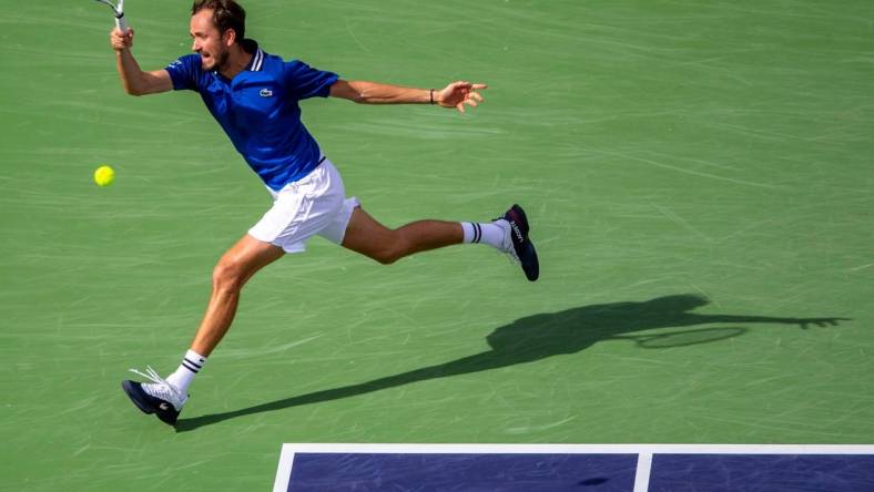 Daniil Medvedev hits to Carlos Alcaraz during the ATP final of the BNP Paribas Open in Indian Wells, Calif., Sunday, March 17, 2024.