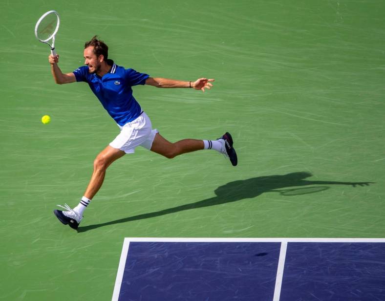 Daniil Medvedev hits to Carlos Alcaraz during the ATP final of the BNP Paribas Open in Indian Wells, Calif., Sunday, March 17, 2024.