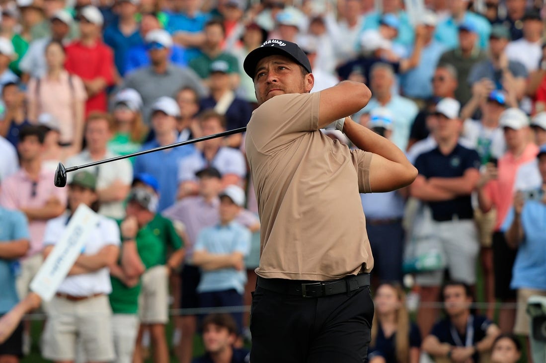 Xander Schauffele tees off hole 18 during the fourth and final round of The Players Championship PGA golf tournament Sunday, March 17, 2024 at TPC Sawgrass in Ponte Vedra Beach, Fla. Scottie Scheffler won at 20 under par and is the first defending champion in the 50 year history of the event. [Corey Perrine/Florida Times-Union]