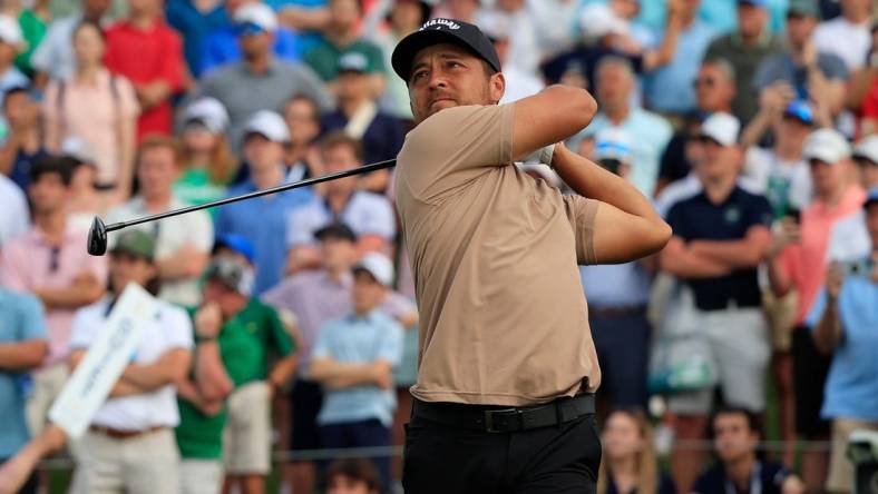 Xander Schauffele tees off hole 18 during the fourth and final round of The Players Championship PGA golf tournament Sunday, March 17, 2024 at TPC Sawgrass in Ponte Vedra Beach, Fla. Scottie Scheffler won at 20 under par and is the first defending champion in the 50 year history of the event. [Corey Perrine/Florida Times-Union]