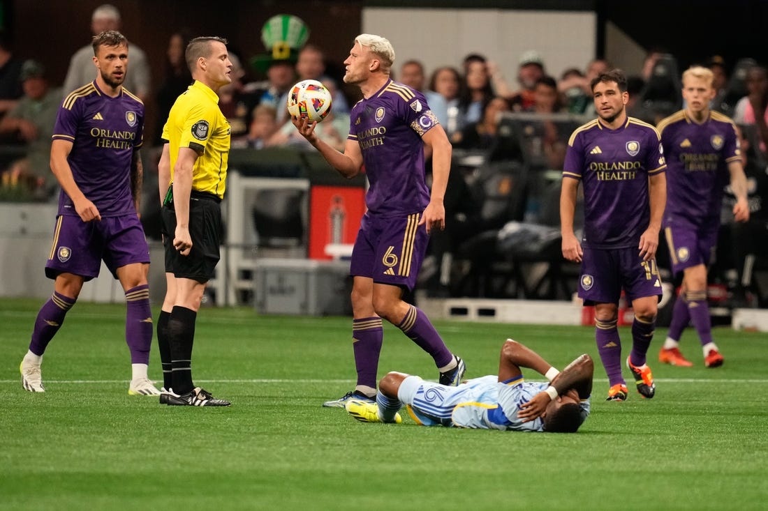 Mar 17, 2024; Atlanta, Georgia, USA; Orlando City defender Robin Jansson (6) reacts after a call during the second half against Atlanta United at Mercedes-Benz Stadium. Mandatory Credit: Dale Zanine-USA TODAY Sports