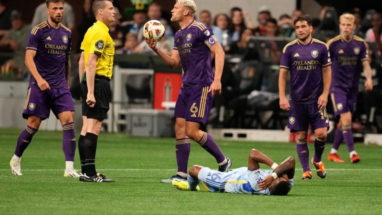 Mar 17, 2024; Atlanta, Georgia, USA; Orlando City defender Robin Jansson (6) reacts after a call during the second half against Atlanta United at Mercedes-Benz Stadium. Mandatory Credit: Dale Zanine-USA TODAY Sports