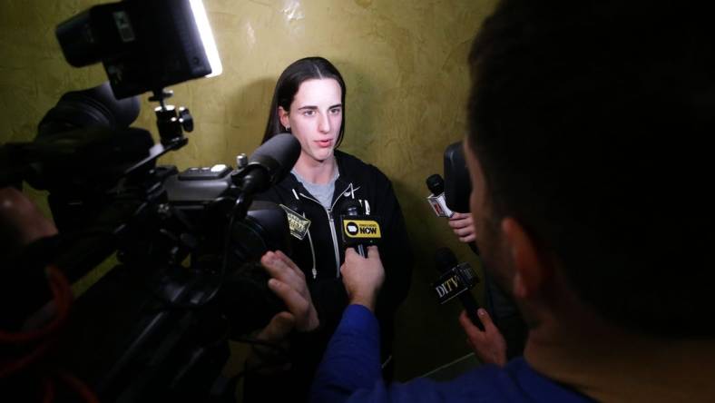 Iowa's Caitlin Clark talks to media after her team was seeded No. 1 in their region of the NCAA Division 1 women   s basketball tournament Sunday, March 17, 2024 in Iowa City, Iowa.