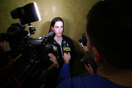 Iowa's Caitlin Clark talks to media after her team was seeded No. 1 in their region of the NCAA Division 1 women   s basketball tournament Sunday, March 17, 2024 in Iowa City, Iowa.