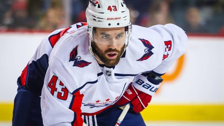 Mar 18, 2024; Calgary, Alberta, CAN; Washington Capitals right wing Tom Wilson (43) during the face off against the Calgary Flames during the first period at Scotiabank Saddledome. Mandatory Credit: Sergei Belski-USA TODAY Sports