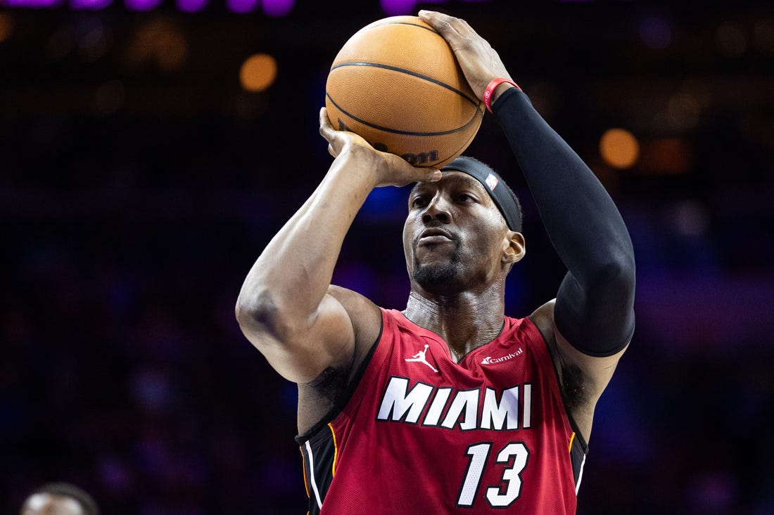 Mar 18, 2024; Philadelphia, Pennsylvania, USA; Miami Heat center Bam Adebayo (13) shoots a foul shot against the Philadelphia 76ers during the third quarter at Wells Fargo Center. Mandatory Credit: Bill Streicher-USA TODAY Sports