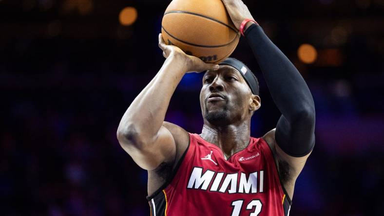 Mar 18, 2024; Philadelphia, Pennsylvania, USA; Miami Heat center Bam Adebayo (13) shoots a foul shot against the Philadelphia 76ers during the third quarter at Wells Fargo Center. Mandatory Credit: Bill Streicher-USA TODAY Sports