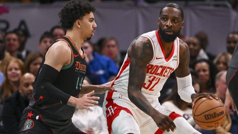 Mar 19, 2024; Washington, District of Columbia, USA; Houston Rockets forward Jeff Green (32) dribbles a sWashington Wizards guard Jules Bernard (14) defends during the first half  at Capital One Arena. Mandatory Credit: Tommy Gilligan-USA TODAY Sports