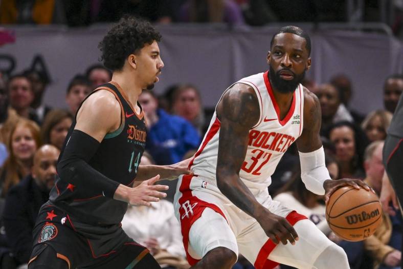 Mar 19, 2024; Washington, District of Columbia, USA; Houston Rockets forward Jeff Green (32) dribbles a sWashington Wizards guard Jules Bernard (14) defends during the first half  at Capital One Arena. Mandatory Credit: Tommy Gilligan-USA TODAY Sports