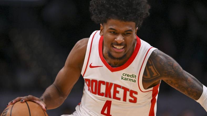 Mar 19, 2024; Washington, District of Columbia, USA; Houston Rockets guard Jalen Green (4) makes a move to the basket during the second half against the Washington Wizards at Capital One Arena. Mandatory Credit: Tommy Gilligan-USA TODAY Sports