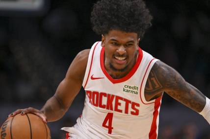 Mar 19, 2024; Washington, District of Columbia, USA; Houston Rockets guard Jalen Green (4) makes a move to the basket during the second half against the Washington Wizards at Capital One Arena. Mandatory Credit: Tommy Gilligan-USA TODAY Sports
