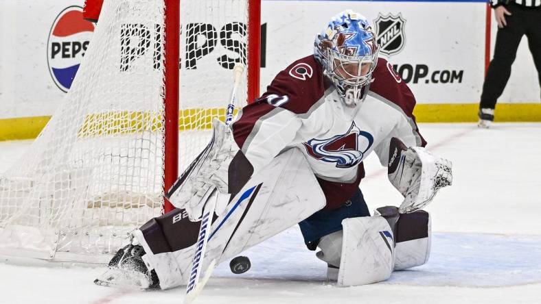 Mar 19, 2024; St. Louis, Missouri, USA;  Colorado Avalanche goaltender Justus Annunen (60) defends the n the against the St. Louis Blues during the second period at Enterprise Center. Mandatory Credit: Jeff Curry-USA TODAY Sports
