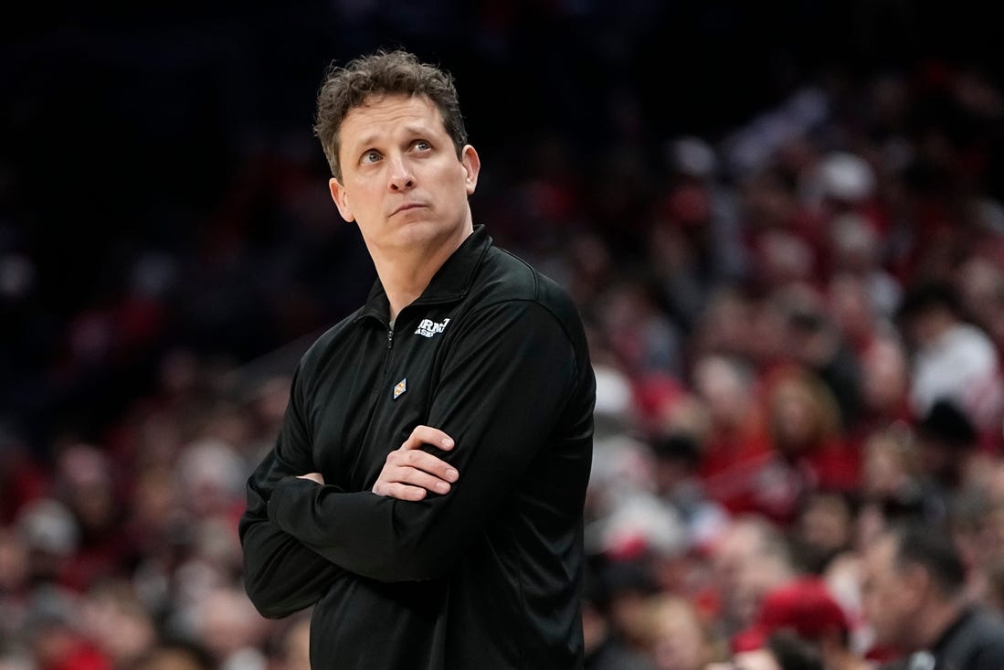 Mar 19, 2024; Columbus, OH, USA; Cornell Big Red head coach Brian Earl watches during the first half of the NIT basketball game against the Ohio State Buckeyes at Value City Arena.