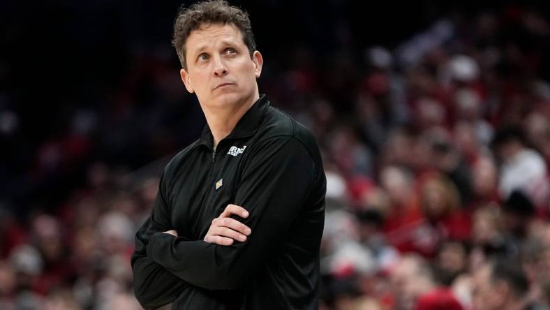 Mar 19, 2024; Columbus, OH, USA; Cornell Big Red head coach Brian Earl watches during the first half of the NIT basketball game against the Ohio State Buckeyes at Value City Arena.