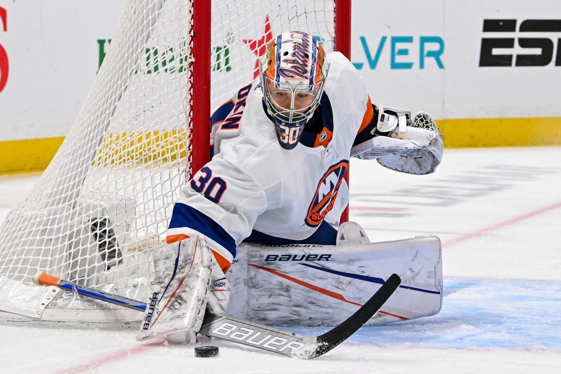 Mar 19, 2024; Elmont, New York, USA; New York Islanders goaltender Ilya Sorokin (30) makes a save against the Carolina Hurricanes during the third period at UBS Arena. Mandatory Credit: Dennis Schneidler-USA TODAY Sports