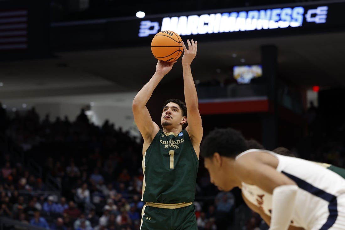 Mar 19, 2024; Dayton, OH, USA; Colorado State Rams forward Joel Scott (1) shoots a free throw in the second half against the Virginia Cavaliers at UD Arena. Mandatory Credit: Rick Osentoski-USA TODAY Sports