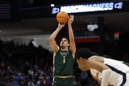 Mar 19, 2024; Dayton, OH, USA; Colorado State Rams forward Joel Scott (1) shoots a free throw in the second half against the Virginia Cavaliers at UD Arena. Mandatory Credit: Rick Osentoski-USA TODAY Sports