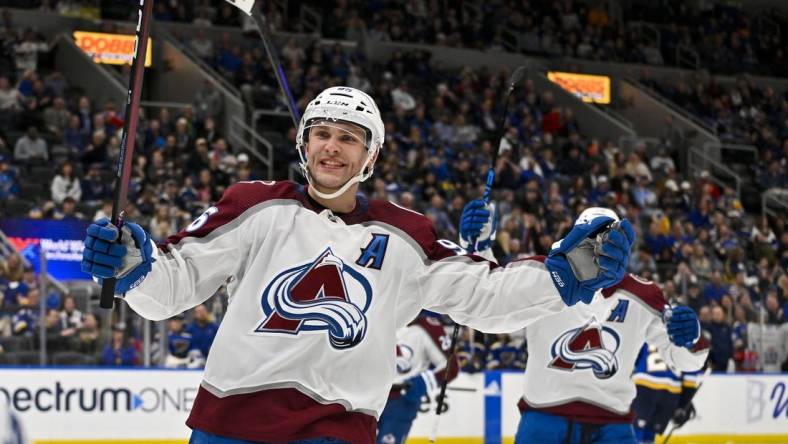 Mar 19, 2024; St. Louis, Missouri, USA;  Colorado Avalanche right wing Mikko Rantanen (96) reacts after scouring his third goal of the game for a hat trick against the St. Louis Blues during the third period at Enterprise Center. Mandatory Credit: Jeff Curry-USA TODAY Sports