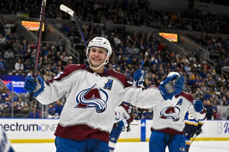 Mar 19, 2024; St. Louis, Missouri, USA;  Colorado Avalanche right wing Mikko Rantanen (96) reacts after scouring his third goal of the game for a hat trick against the St. Louis Blues during the third period at Enterprise Center. Mandatory Credit: Jeff Curry-USA TODAY Sports