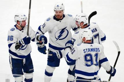 Mar 19, 2024; Las Vegas, Nevada, USA; Tampa Bay Lightning right wing Nikita Kucherov (86) celebrates with team mates after scoring an empty net goal against the Vegas Golden Knights during the third period at T-Mobile Arena. Mandatory Credit: Stephen R. Sylvanie-USA TODAY Sports