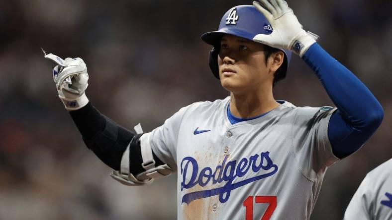 [US, Mexico & Canada customers only] March 20, 2024; Seoul, SOUTH KOREA; Los Angeles Dodgers player Shohei Ohtani reacts against the San Diego Padres during a MLB regular season Seoul Series game at Gocheok Sky Dome. Mandatory Credit: Kim Hong-Ji/Reuters via USA TODAY Sports