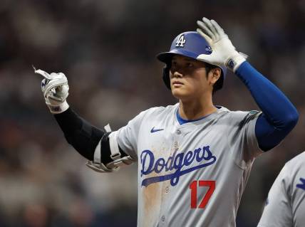 [US, Mexico & Canada customers only] March 20, 2024; Seoul, SOUTH KOREA; Los Angeles Dodgers player Shohei Ohtani reacts against the San Diego Padres during a MLB regular season Seoul Series game at Gocheok Sky Dome. Mandatory Credit: Kim Hong-Ji/Reuters via USA TODAY Sports