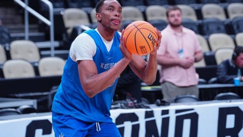 Mar 20, 2024; Pittsburgh, PA, USA; Kentucky Wildcats guard Adou Thiero (3) shoots the ball during the NCAA first round practice session at PPG Paints Arena. Mandatory Credit: Gregory Fisher-USA TODAY Sports