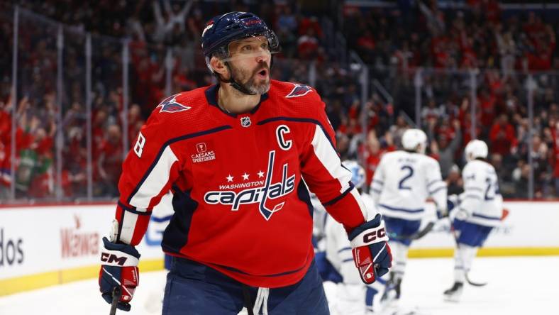 Mar 20, 2024; Washington, District of Columbia, USA; Washington Capitals left wing Alex Ovechkin (8) celebrates after scoring a goal against the Toronto Maple Leafs during the third period at Capital One Arena. Mandatory Credit: Amber Searls-USA TODAY Sports