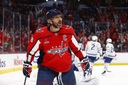 Mar 20, 2024; Washington, District of Columbia, USA; Washington Capitals left wing Alex Ovechkin (8) celebrates after scoring a goal against the Toronto Maple Leafs during the third period at Capital One Arena. Mandatory Credit: Amber Searls-USA TODAY Sports