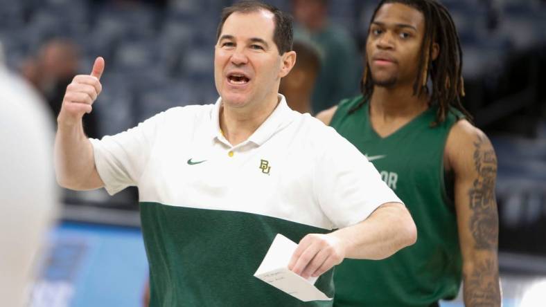 Baylor’s head coach Scott Drew directs his players during open practices for 2024 NCAA Tournament teams at FedExForum in Memphis, Tenn., on Thursday, March 21, 2024.