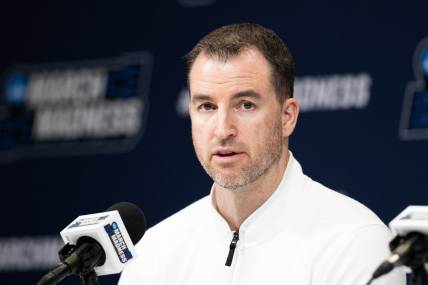 Mar 21, 2024; Indianapolis, IN, USA; Utah State Aggies head coach Danny Sprinkle talks to the media during the practice day at Gainbridge FieldHouse. Mandatory Credit: Trevor Ruszkowski-USA TODAY Sports