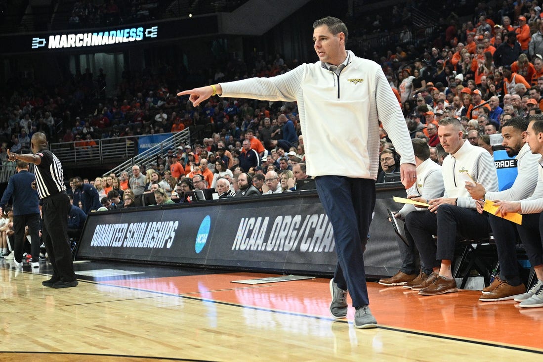 Mar 21, 2024; Omaha, NE, USA; Morehead State Eagles head coach Preston Spradlin directs his team in the second half against the Illinois Fighting Illini during the first round of the NCAA Tournament at CHI Health Center Omaha. Mandatory Credit: Steven Branscombe-USA TODAY Sports