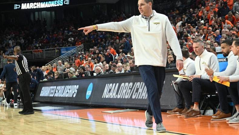 Mar 21, 2024; Omaha, NE, USA; Morehead State Eagles head coach Preston Spradlin directs his team in the second half against the Illinois Fighting Illini during the first round of the NCAA Tournament at CHI Health Center Omaha. Mandatory Credit: Steven Branscombe-USA TODAY Sports