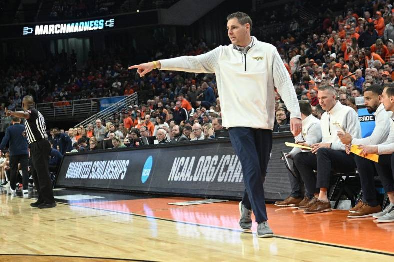 Mar 21, 2024; Omaha, NE, USA; Morehead State Eagles head coach Preston Spradlin directs his team in the second half against the Illinois Fighting Illini during the first round of the NCAA Tournament at CHI Health Center Omaha. Mandatory Credit: Steven Branscombe-USA TODAY Sports