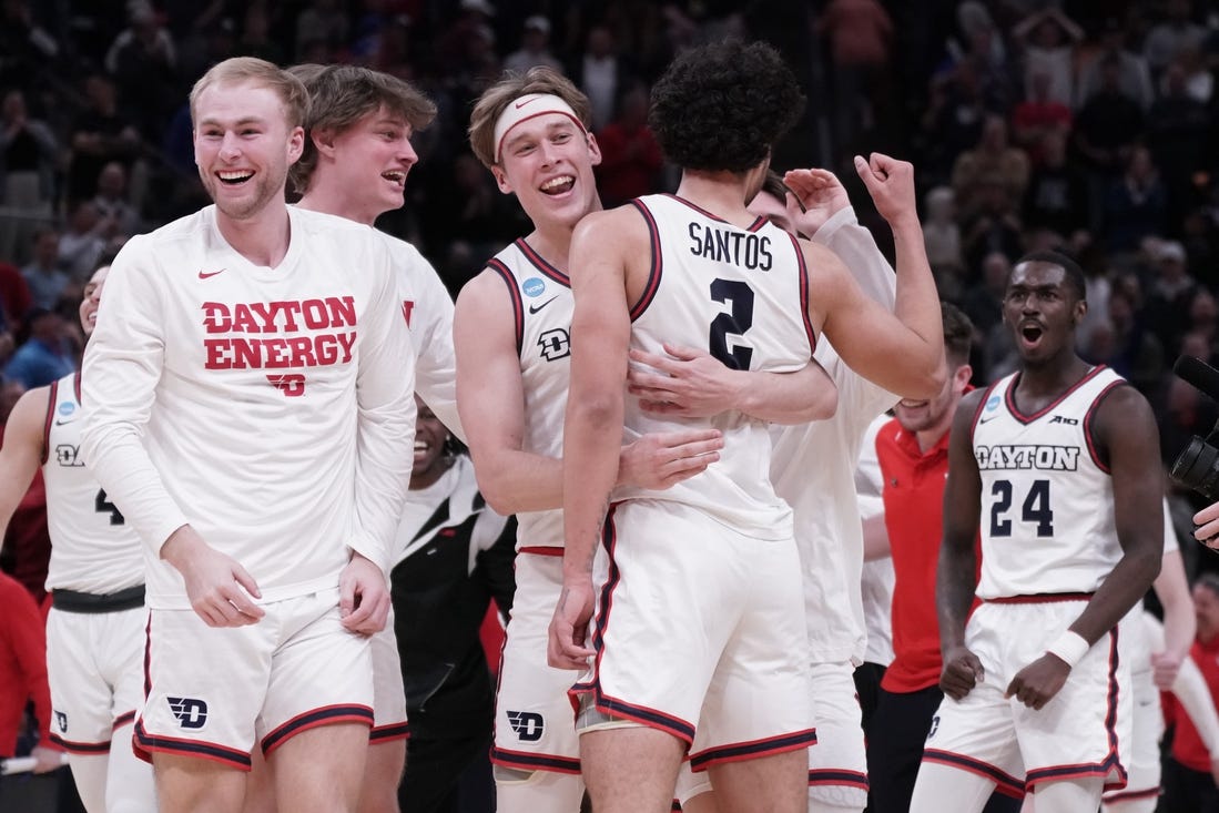 Mar 21, 2024; Salt Lake City, UT, USA; The Dayton Flyers celebrate the win against Nevada Wolf Pack after the second half in the first round of the 2024 NCAA Tournament at Vivint Smart Home Arena-Delta Center. Mandatory Credit: Gabriel Mayberry-USA TODAY Sports