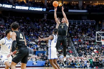 Mar 21, 2024; Pittsburgh, PA, USA; Oakland Golden Grizzlies guard Jack Gohlke (3) jump to score a three pointer during the second half in the first round of the 2024 NCAA Tournament at PPG Paints Arena. Mandatory Credit: Charles LeClaire-USA TODAY Sports