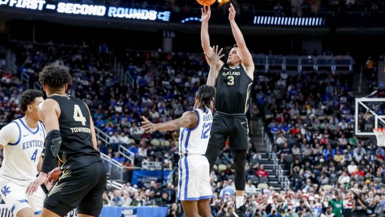 Mar 21, 2024; Pittsburgh, PA, USA; Oakland Golden Grizzlies guard Jack Gohlke (3) jump to score a three pointer during the second half in the first round of the 2024 NCAA Tournament at PPG Paints Arena. Mandatory Credit: Charles LeClaire-USA TODAY Sports