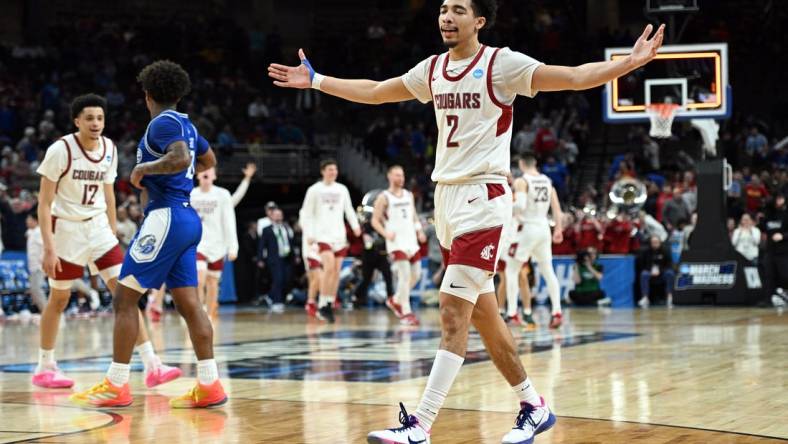 Mar 21, 2024; Omaha, NE, USA; Washington State Cougars guard Myles Rice (2) celebrates after defeating the Drake Bulldogs in the first round of the 2024 NCAA Tournament at CHI Health Center Omaha. Mandatory Credit: Steven Branscombe-USA TODAY Sports