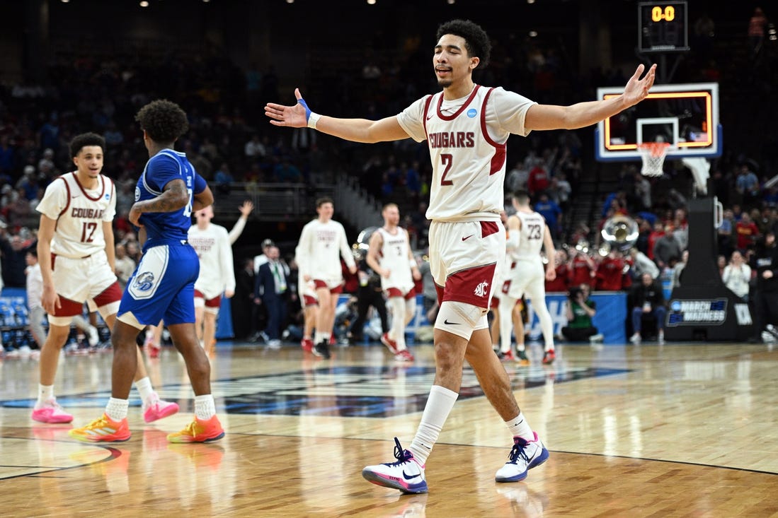 Mar 21, 2024; Omaha, NE, USA; Washington State Cougars guard Myles Rice (2) celebrates after defeating the Drake Bulldogs in the first round of the 2024 NCAA Tournament at CHI Health Center Omaha. Mandatory Credit: Steven Branscombe-USA TODAY Sports