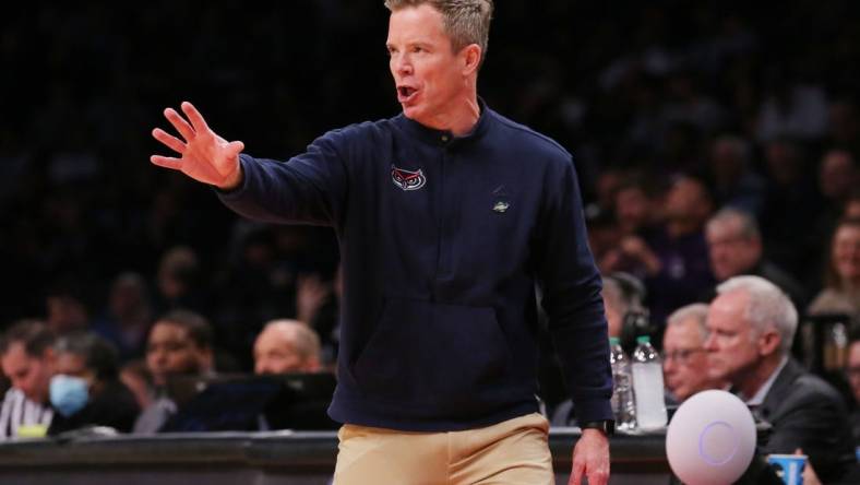 March 22, 2024, Brooklyn, NY, USA;  Florida Atlantic Owls head coach Dusty May reacts against the Northwestern Wildcats in the first round of the 2024 NCAA Tournament at the Barclays Center. Mandatory Credit: Brad Penner-USA TODAY Sports