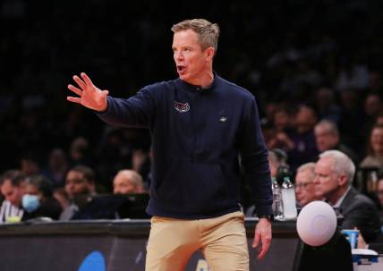 March 22, 2024, Brooklyn, NY, USA;  Florida Atlantic Owls head coach Dusty May reacts against the Northwestern Wildcats in the first round of the 2024 NCAA Tournament at the Barclays Center. Mandatory Credit: Brad Penner-USA TODAY Sports