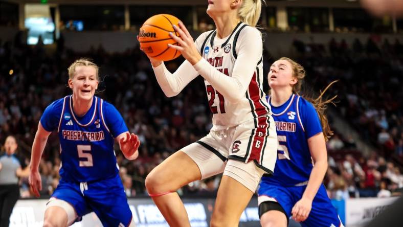 Mar 22, 2024; Columbia, SC, USA; South Carolina Gamecocks forward Chloe Kitts (21) drives against the Presbyterian Blue Hose in the first half at Colonial Life Arena. Mandatory Credit: Jeff Blake-USA TODAY Sports