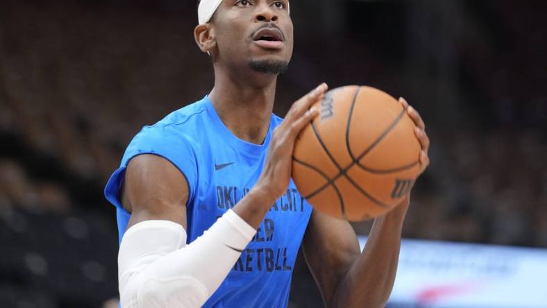 Mar 22, 2024; Toronto, Ontario, CAN; Oklahoma City Thunder guard Shai Gilgeous-Alexander (2) goes to shoot a basket during warm up before a game against the Toronto Raptors at Scotiabank Arena. Mandatory Credit: John E. Sokolowski-USA TODAY Sports