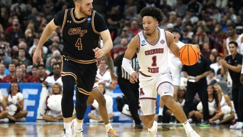 Mar 22, 2024; Spokane, WA, USA; Alabama Crimson Tide guard Mark Sears (1) dribbles against Charleston Cougars guard Bryce Butler (4) during the first half in the first round of the 2024 NCAA Tournament at Spokane Veterans Memorial Arena. Mandatory Credit: Kirby Lee-USA TODAY Sports