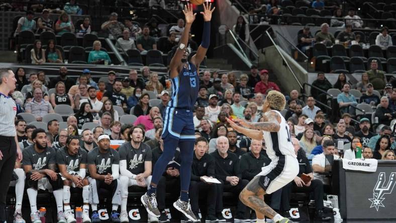 Mar 22, 2024; San Antonio, Texas, USA; Memphis Grizzlies forward Jaren Jackson Jr. (13) shoots over San Antonio Spurs forward Jeremy Sochan (10) in the first half at Frost Bank Center. Mandatory Credit: Daniel Dunn-USA TODAY Sports